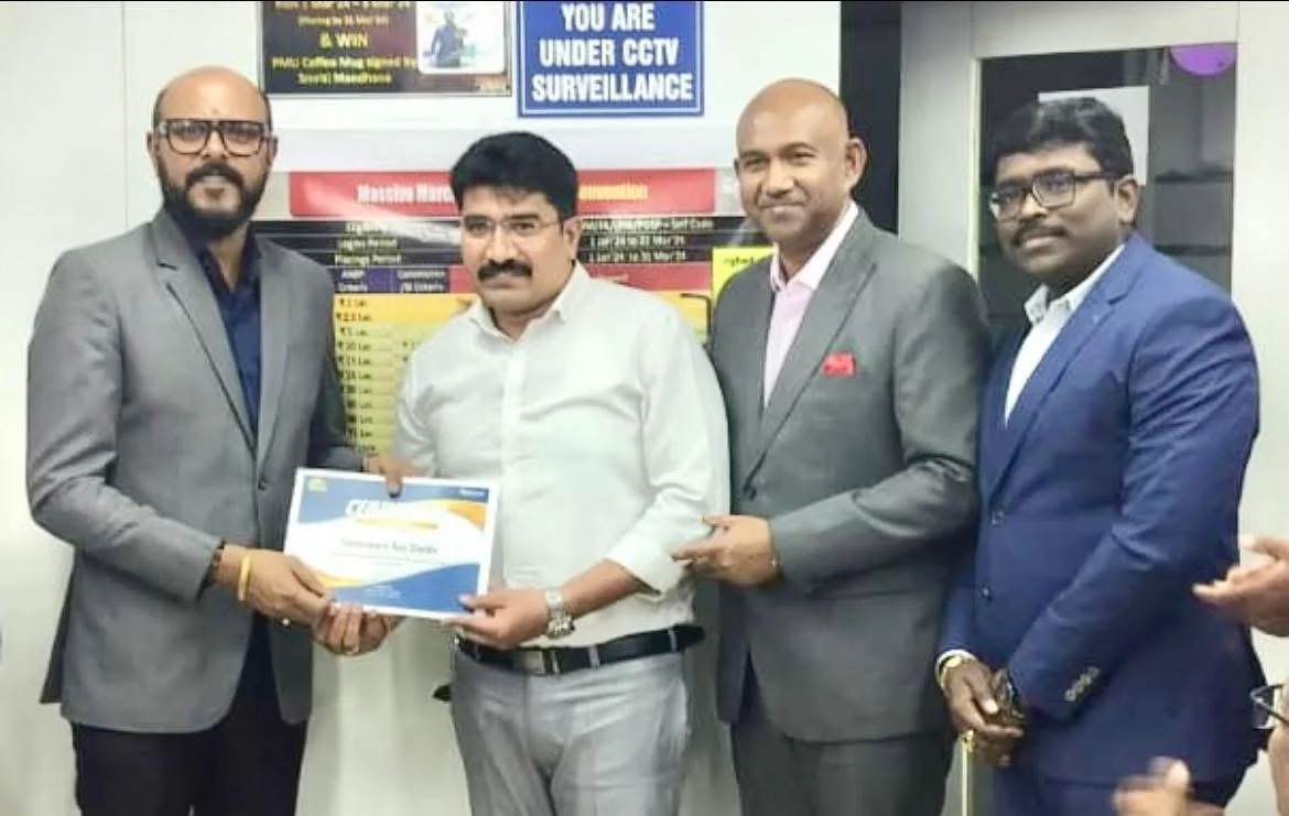 Datteswara Rao Sheikh at a recognition presentation with colleagues