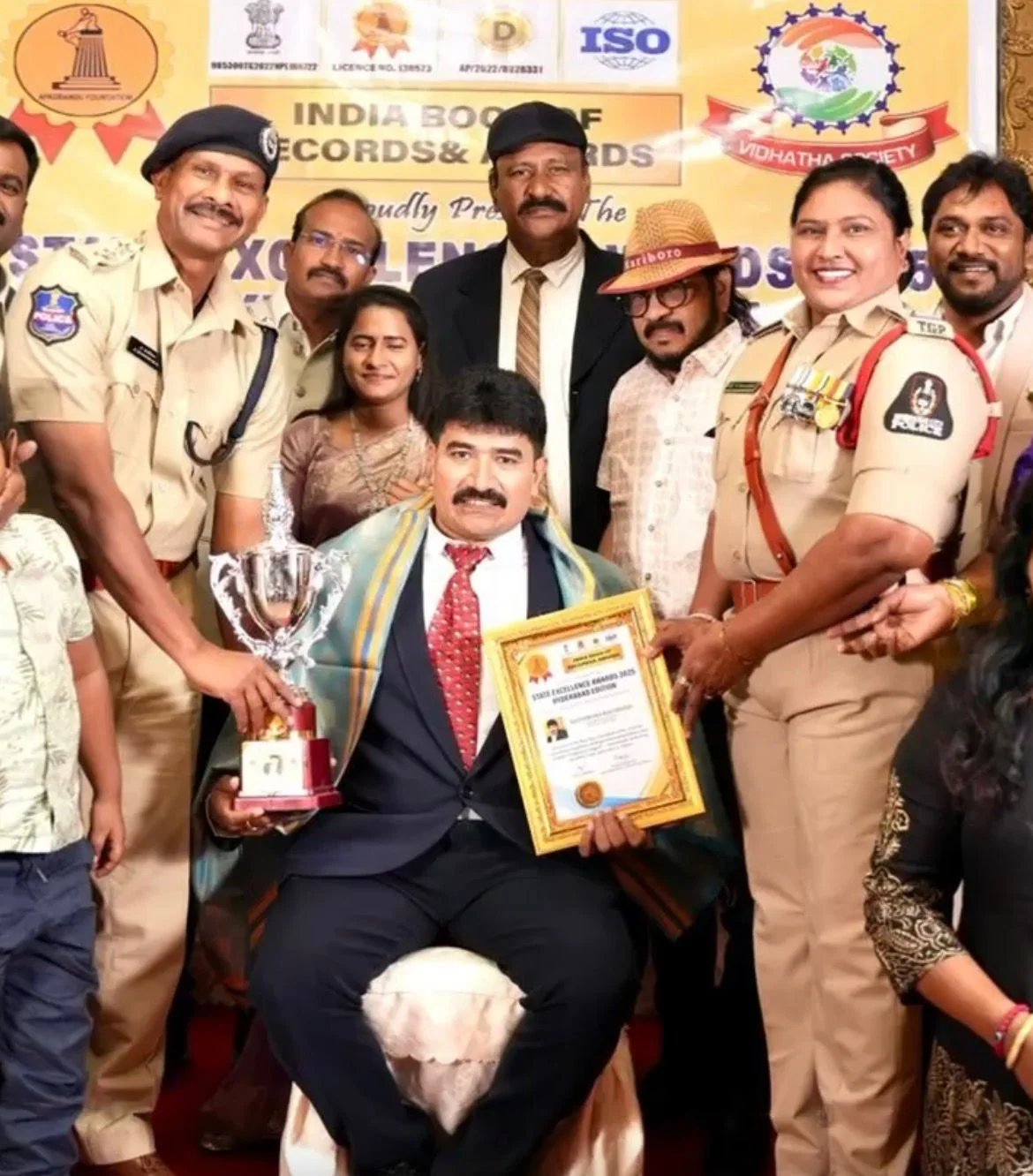 Datteswara Rao Sheikh receiving recognition at an awards event
