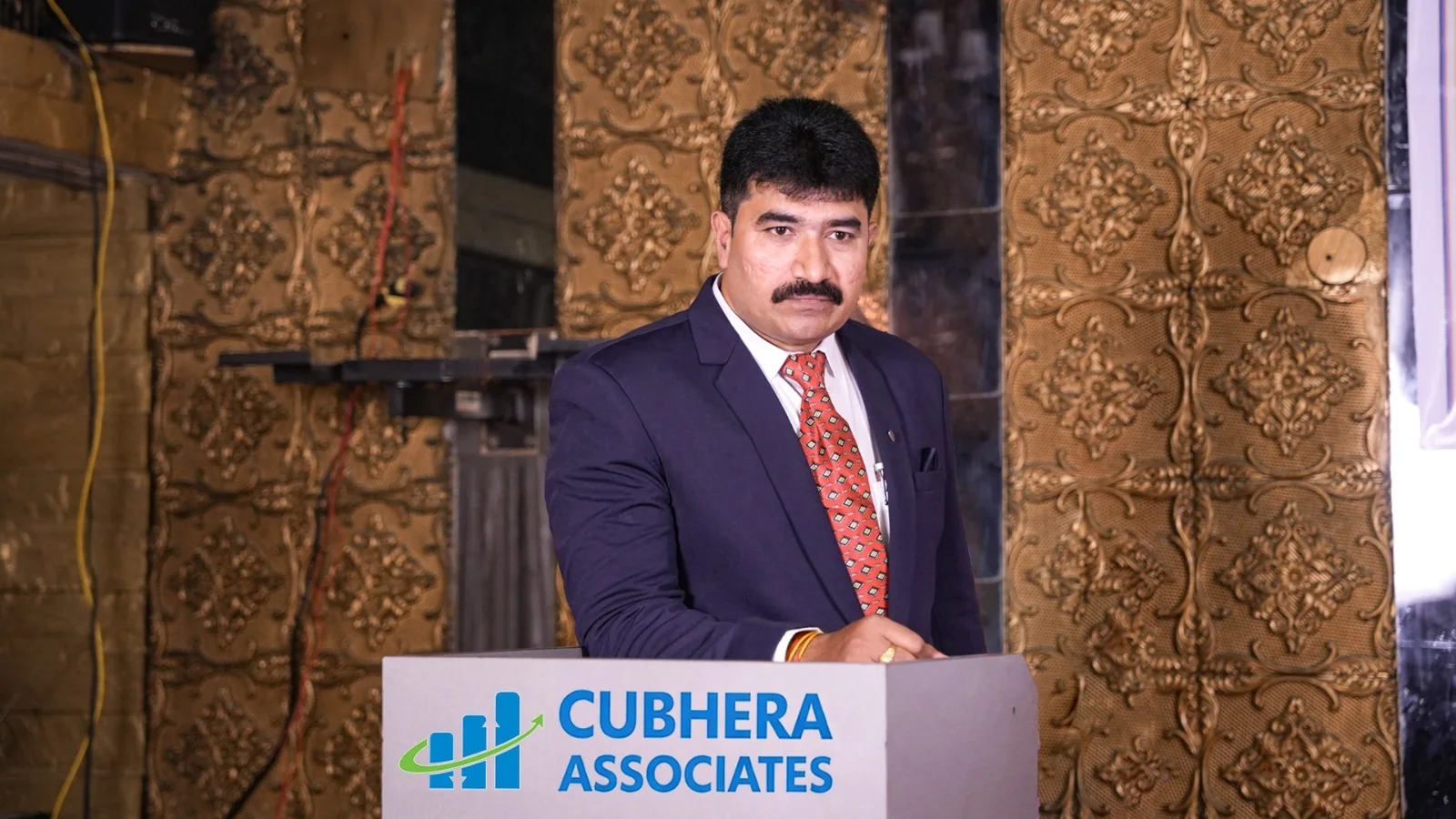 Datteswara Rao Sheikh speaking at a Cubhera Associates event